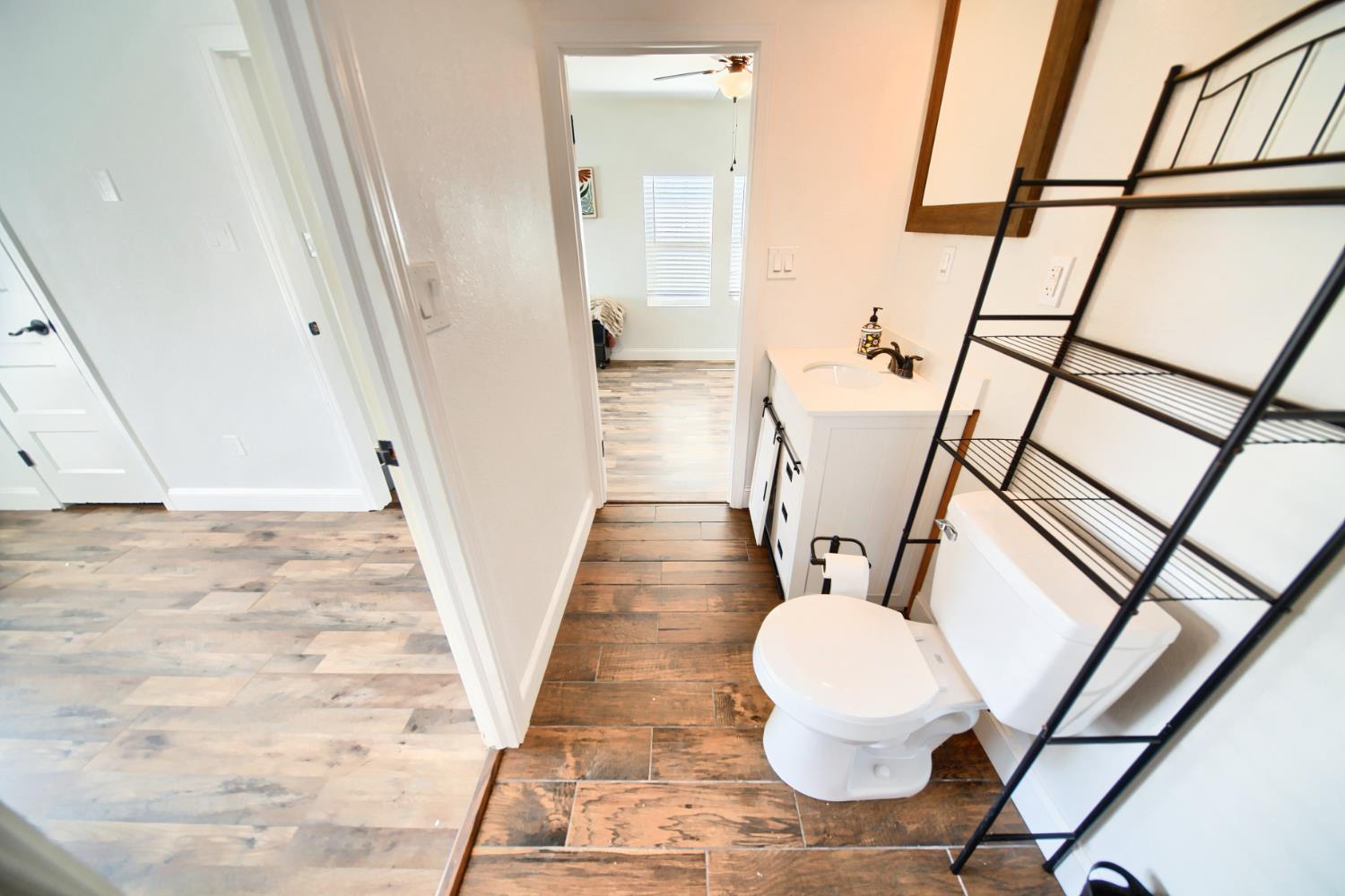 131 5th Street Gustine, CA 95322 - Photo 36 of 92 a view of an entryway with wooden floor