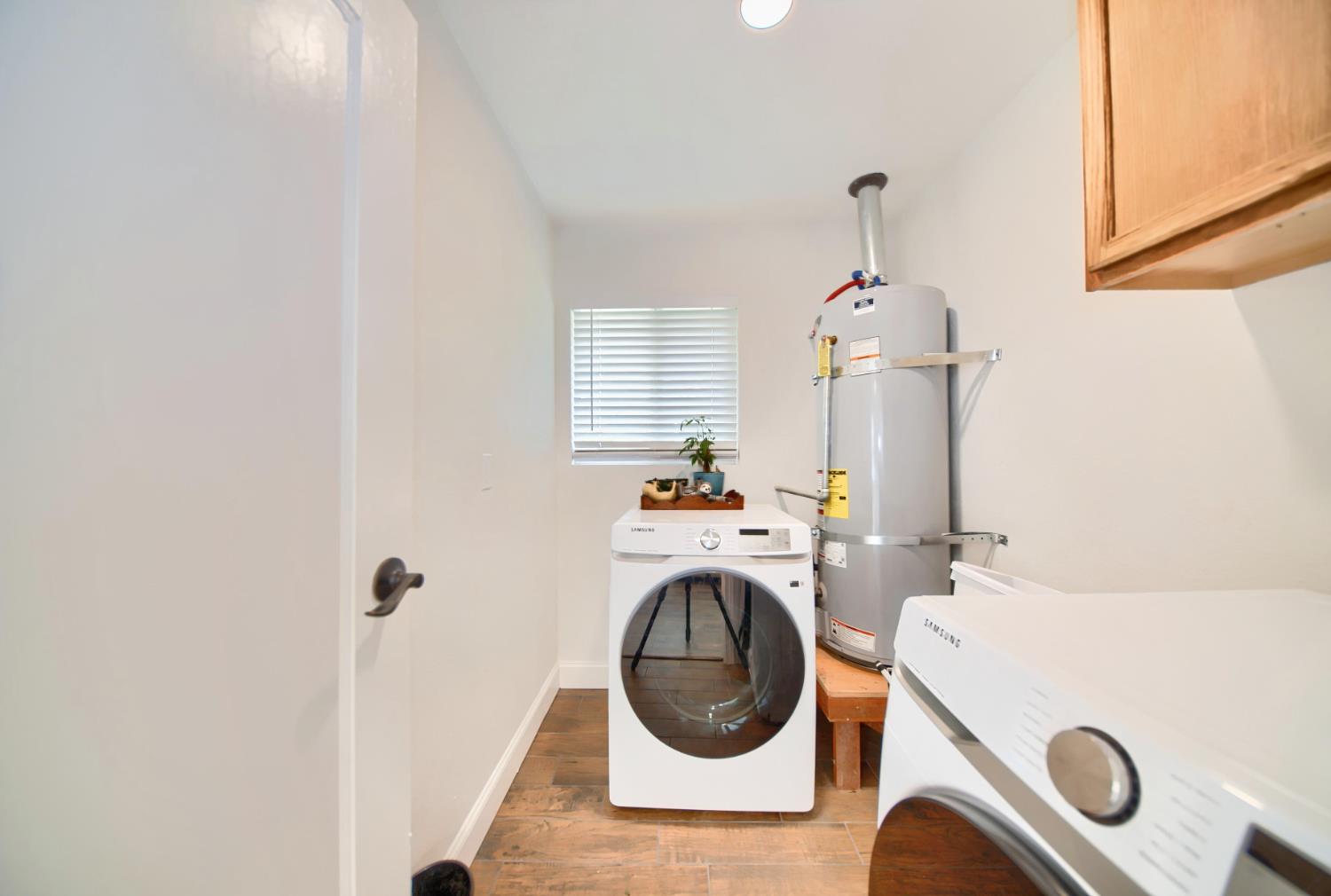 131 5th Street Gustine, CA 95322 - Photo 69 of 92 a utility room with dryer and washer