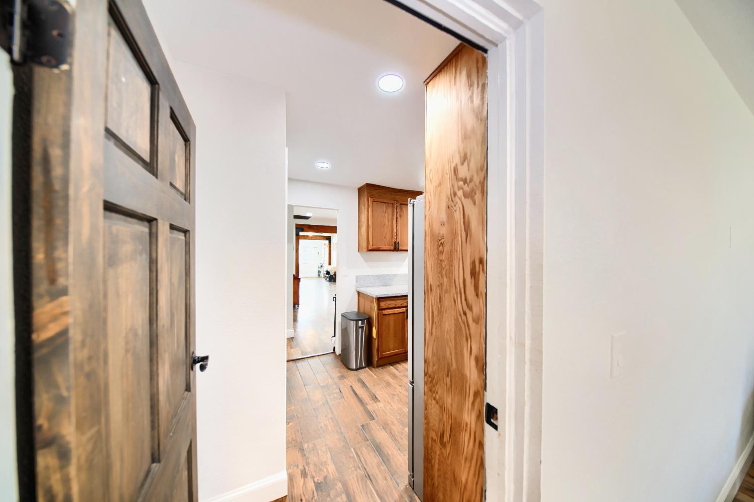131 5th Street Gustine, CA 95322 - Photo 73 of 92 a view of a bedroom from a hallway