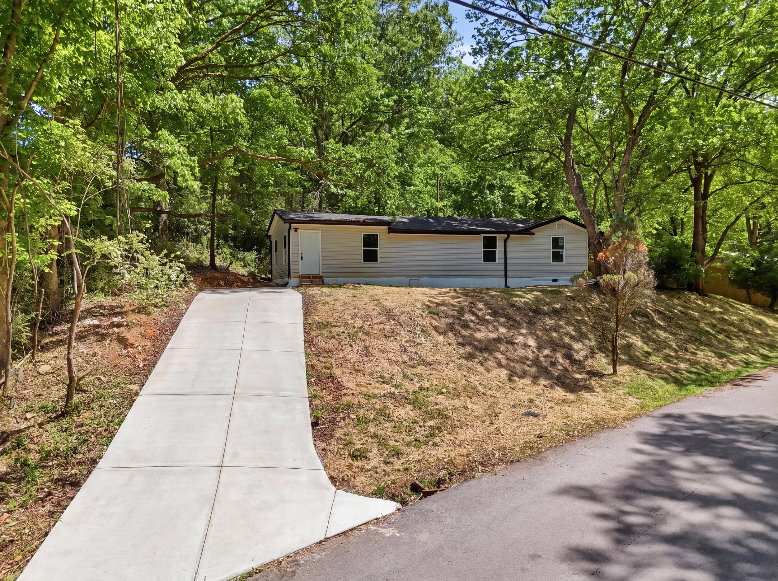 6209 Massengale Hollow Road Harrison, TN 37341 - Photo 2 of 31 dji_20260501021116_0314_d_reedit_4ab2234