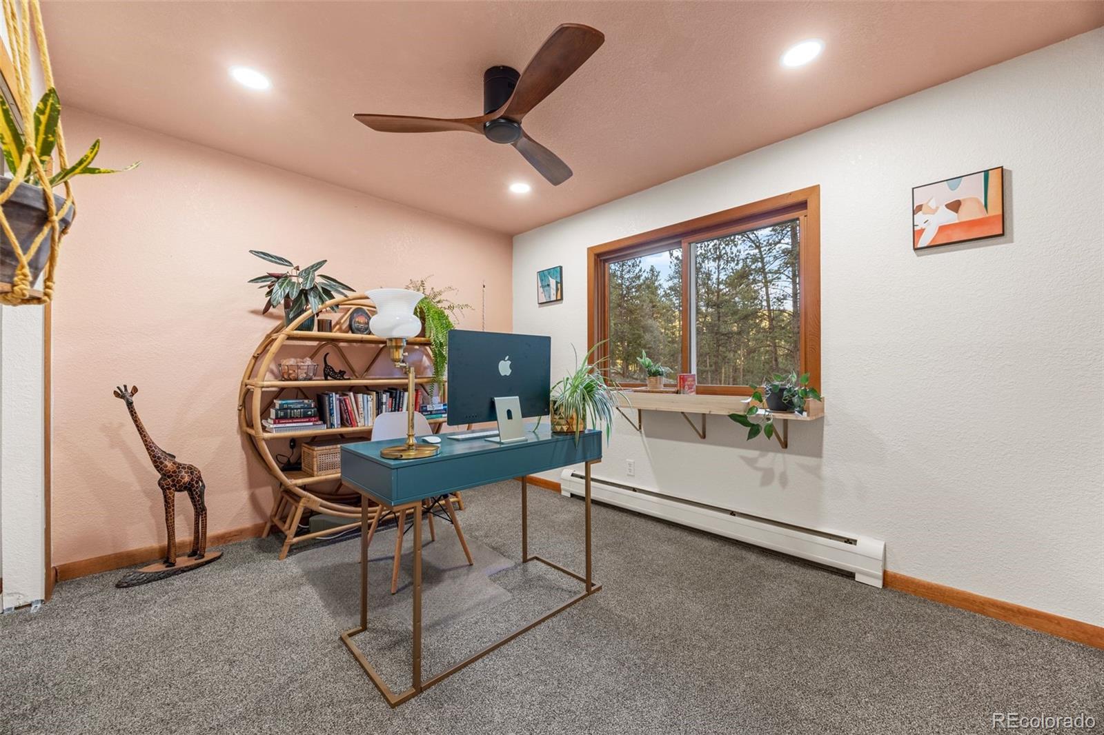 22 Driver Road Bailey, CO 80421 - Photo 13 of 24 a view of a workspace with furniture