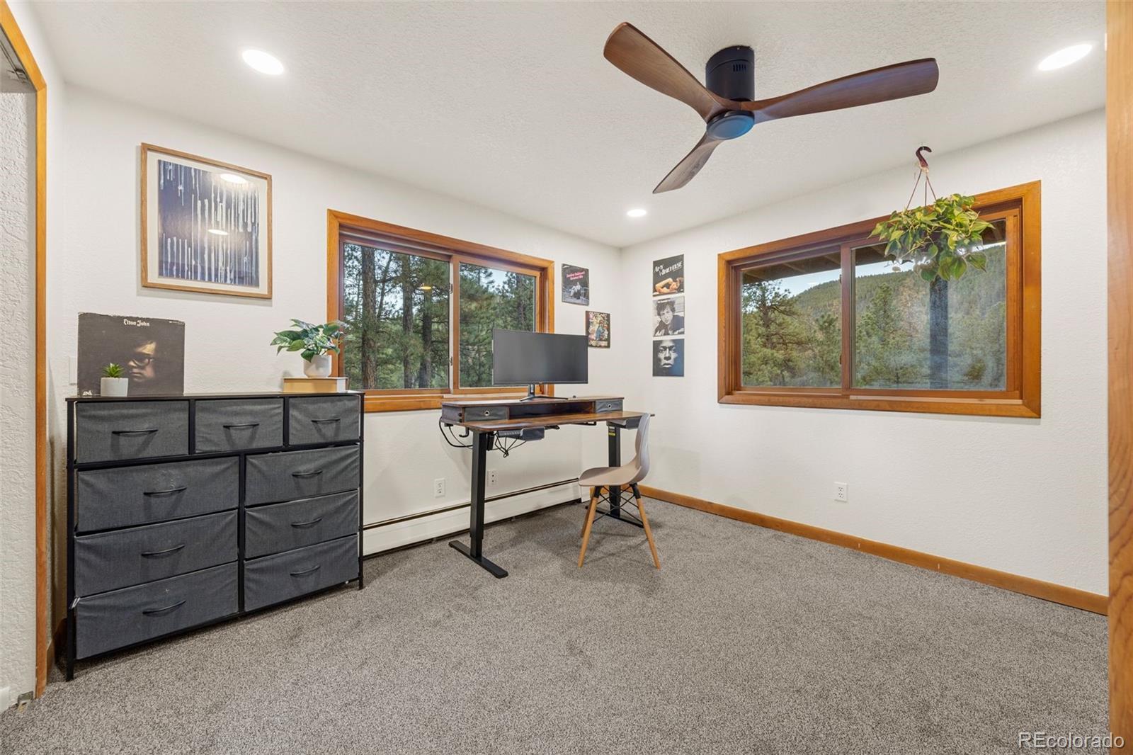 22 Driver Road Bailey, CO 80421 - Photo 18 of 24 a view of a workspace with furniture and a window