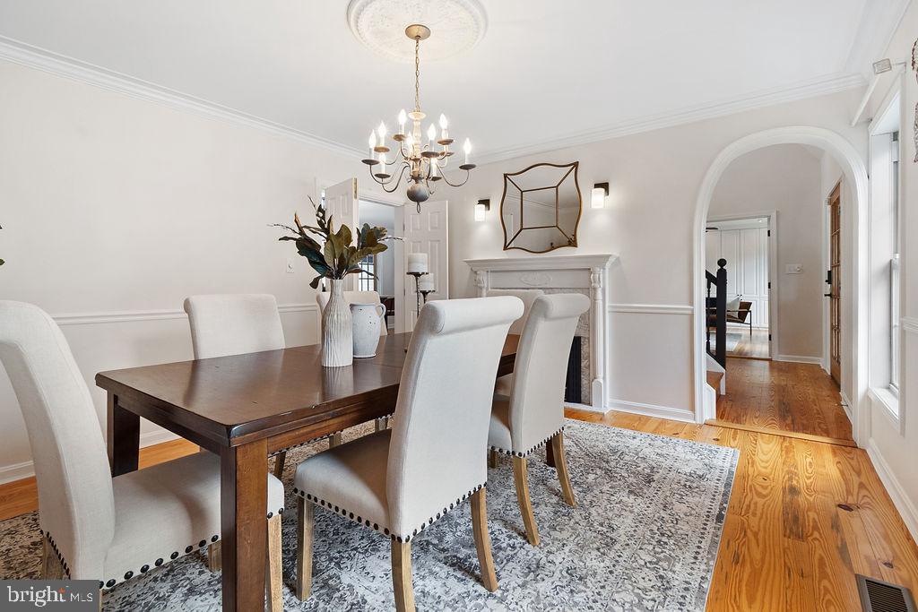 19821 Foggy Bottom Road Bluemont, VA 20135 - Photo 69 of 92 a view of a dining room with furniture and chandelier