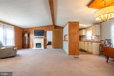 a view of livingroom with furniture and fireplace