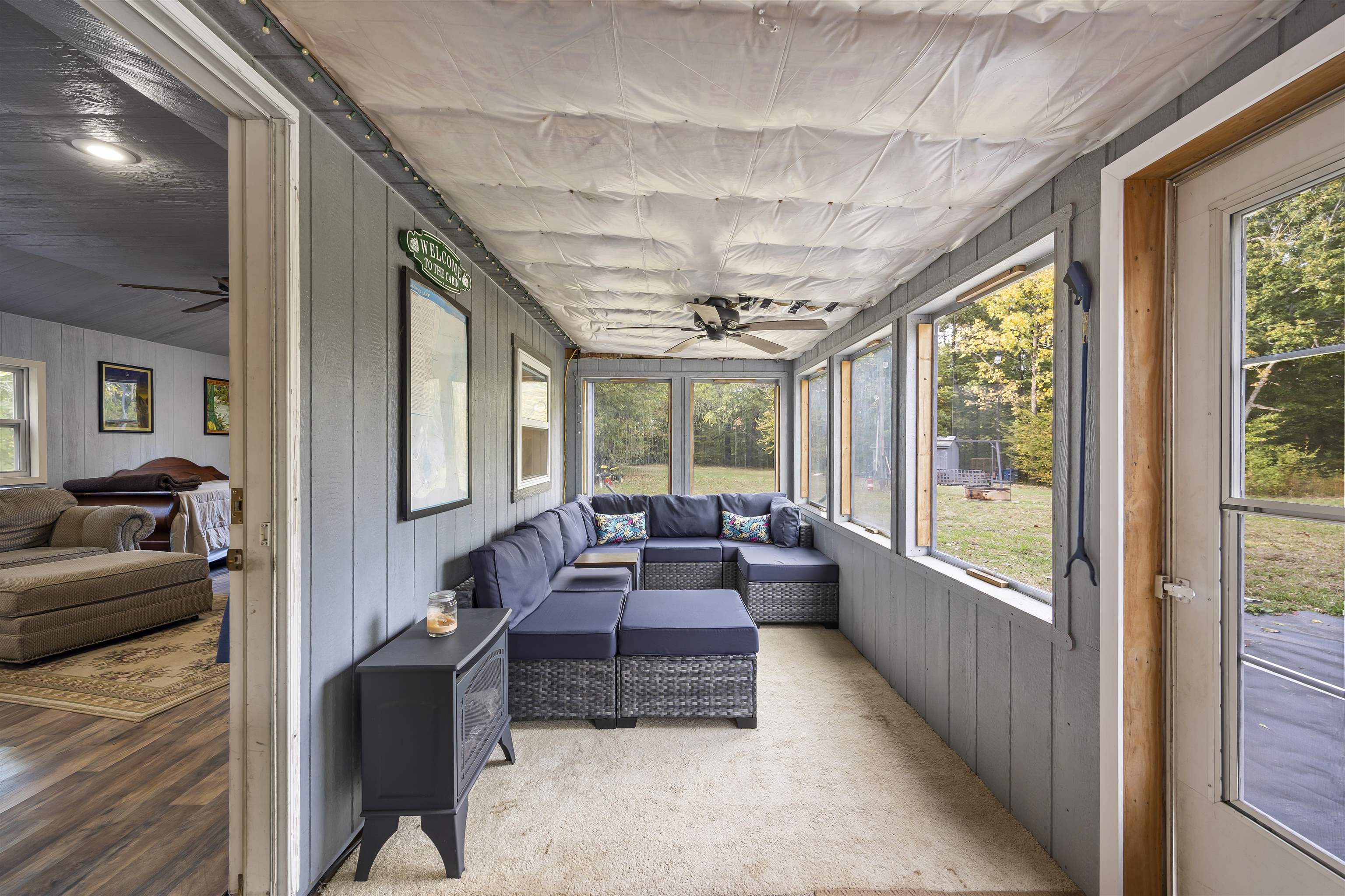 4830 Kendall Road Hornbeak, TN 38232 - Photo 13 of 37 a living room with furniture and large windows
