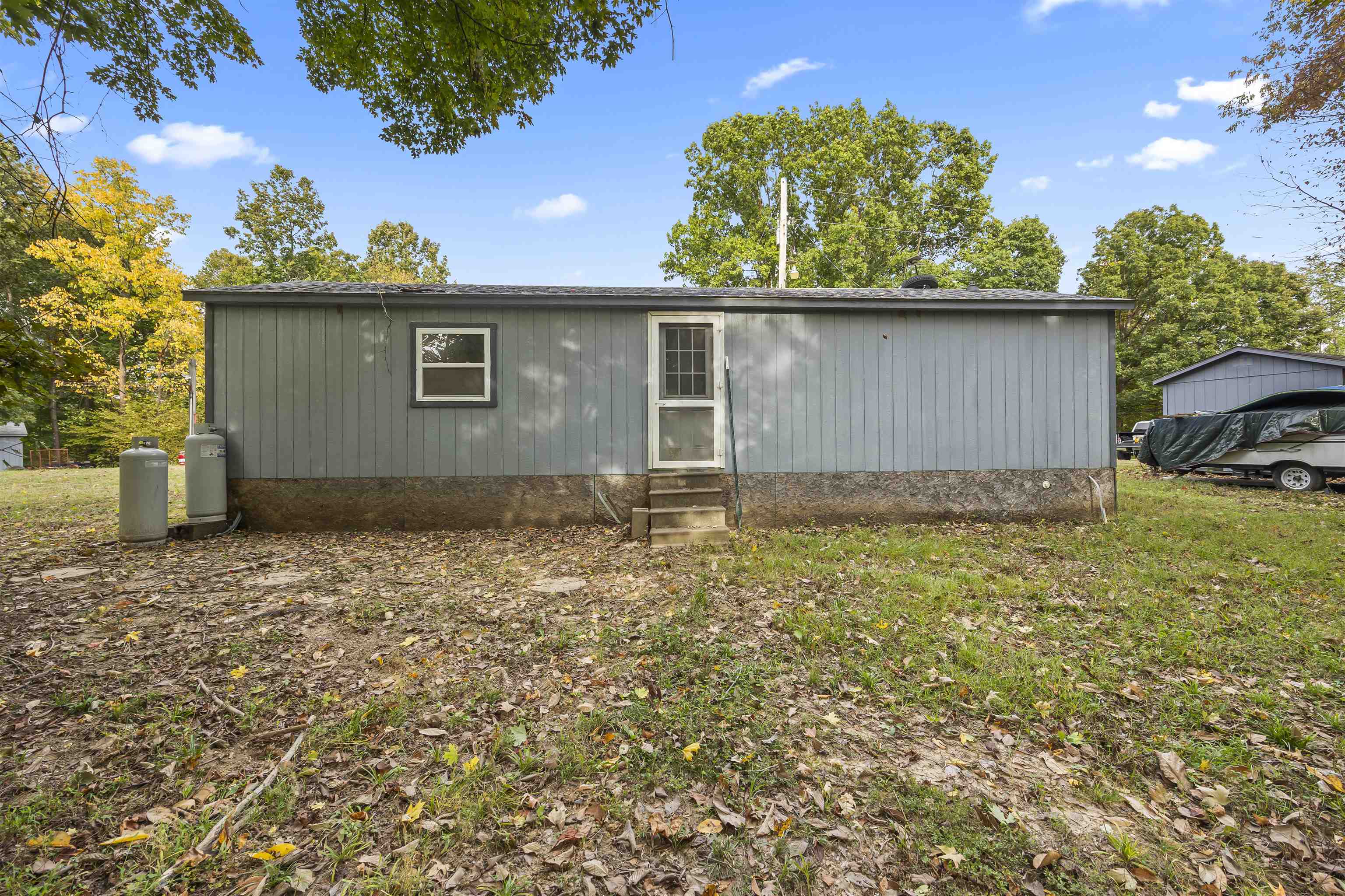 4830 Kendall Road Hornbeak, TN 38232 - Photo 15 of 37 front view of a house with a yard
