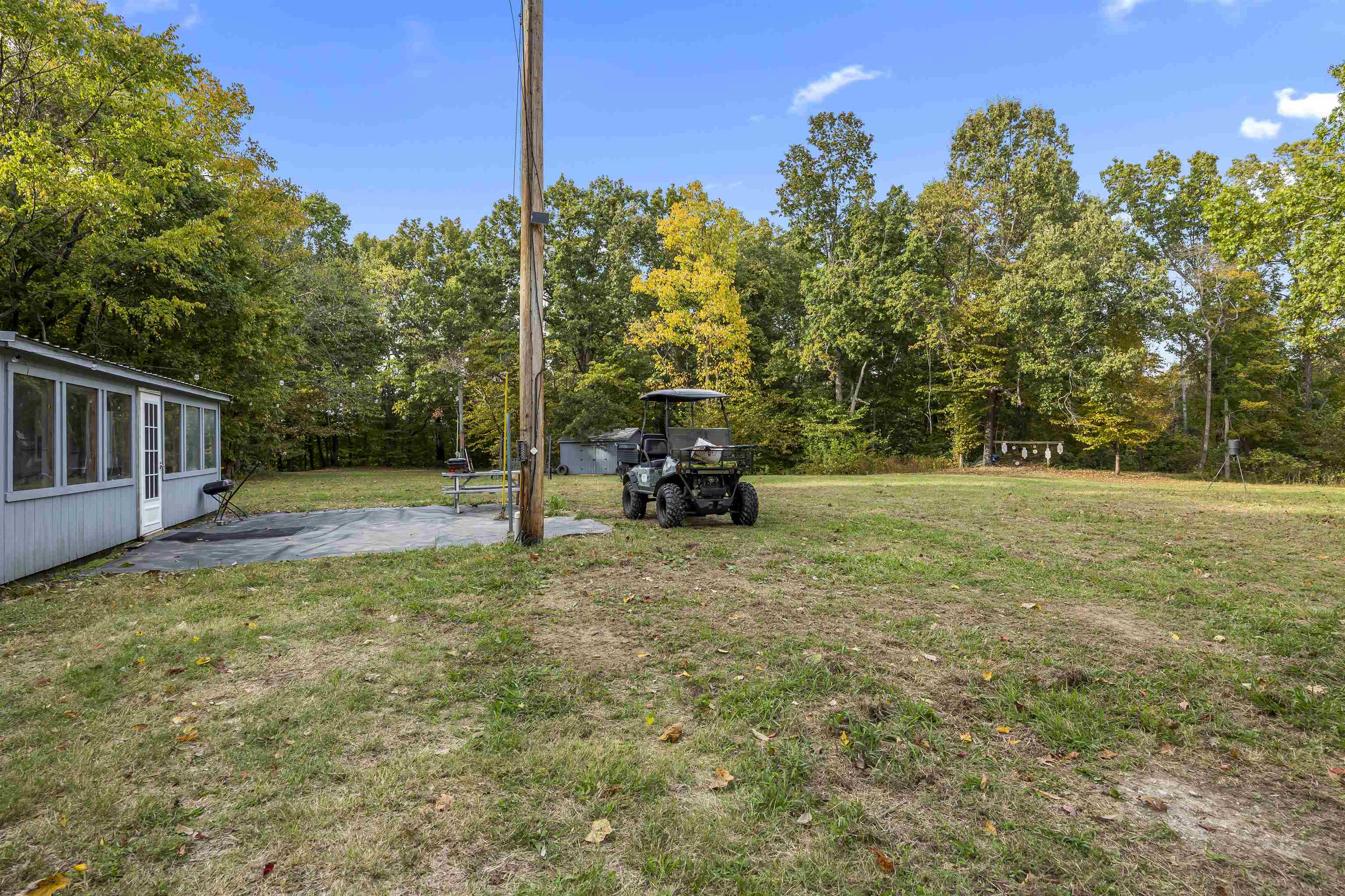 4830 Kendall Road Hornbeak, TN 38232 - Photo 18 of 37 a view of a house with backyard and trees