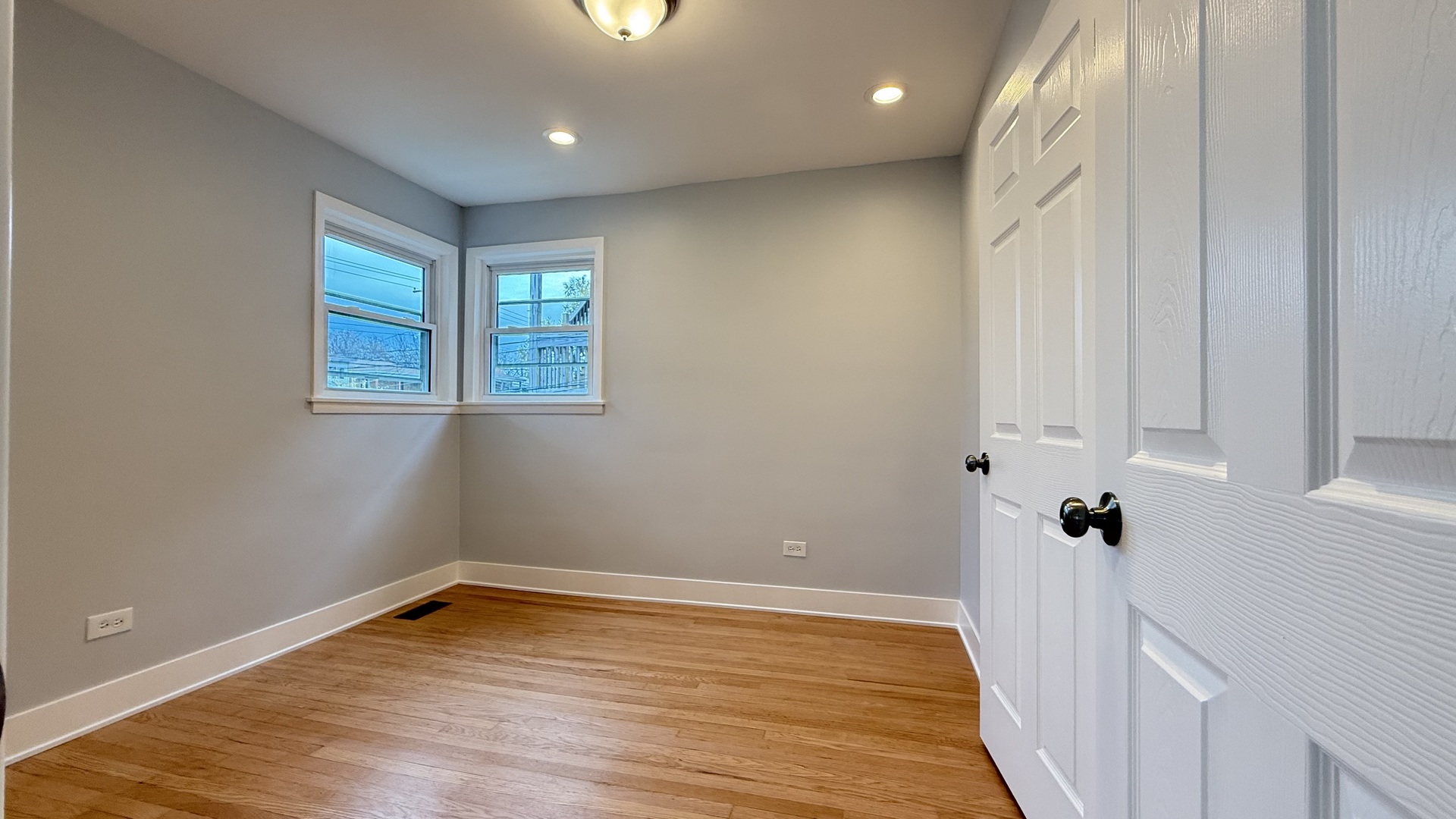 1345 North Latrobe Avenue Chicago, IL 60651 - Photo 14 of 50 a view of a room with wooden floor and window