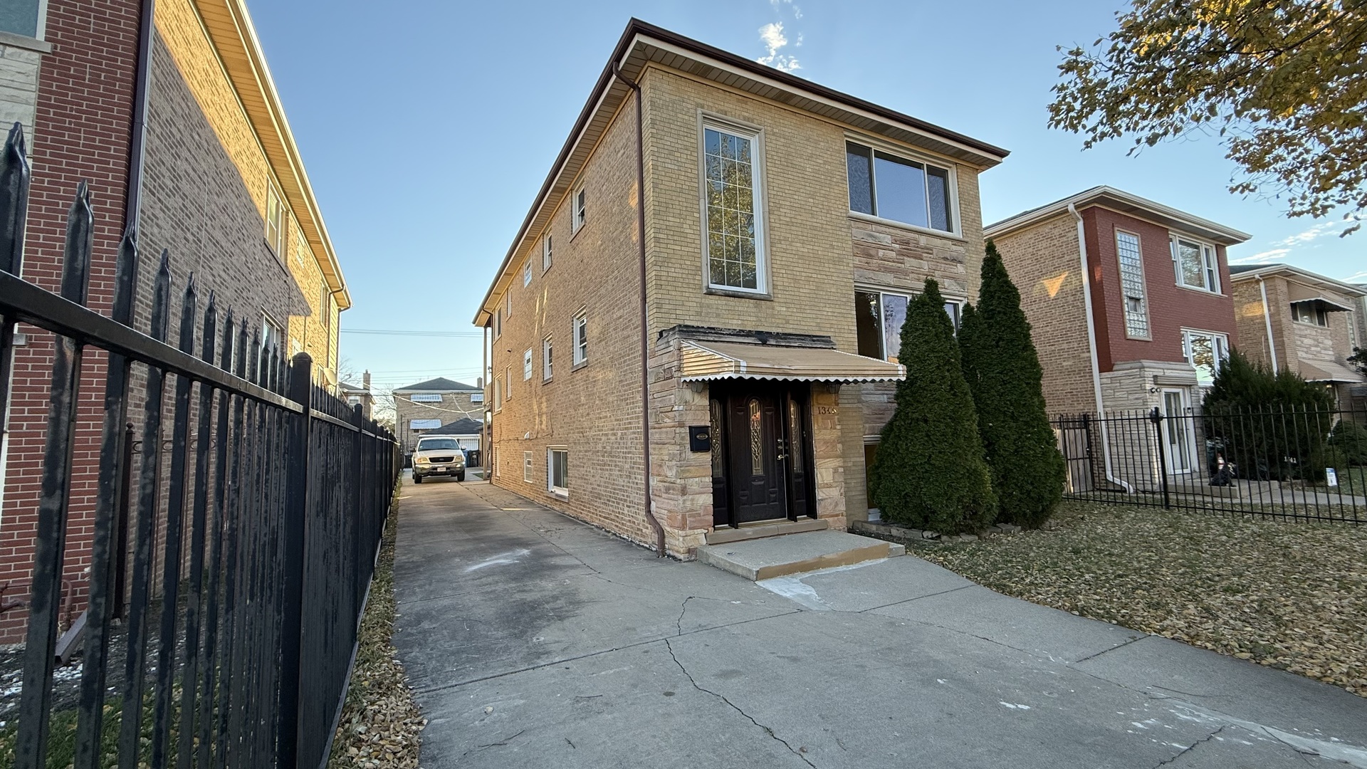 1345 North Latrobe Avenue Chicago, IL 60651 - Photo 2 of 50 a view of a house with a backyard