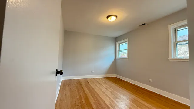 a kitchen with stainless steel appliances granite countertop a refrigerator and a stove