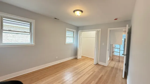 a kitchen with stainless steel appliances granite countertop a refrigerator stove microwave and sink