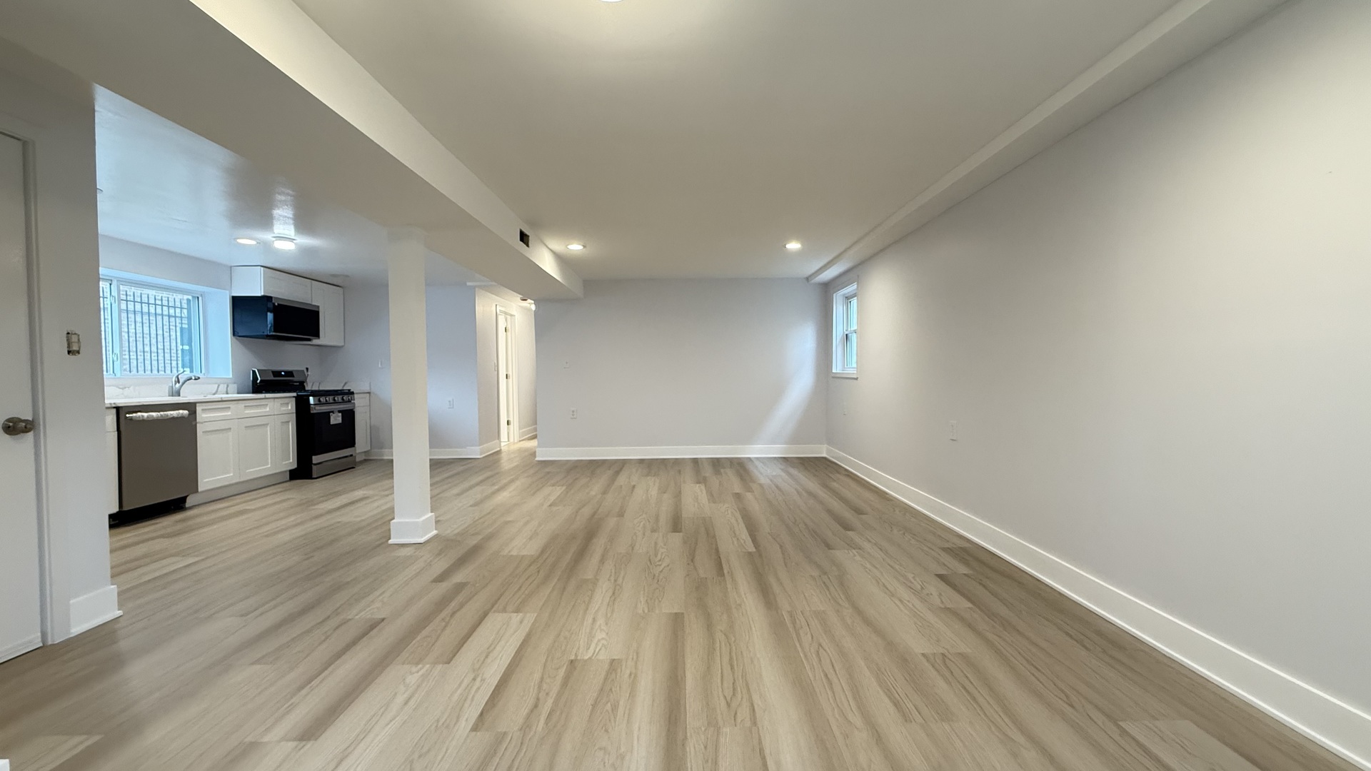 1345 North Latrobe Avenue Chicago, IL 60651 - Photo 41 of 50 a view of a kitchen with wooden floor and a sink