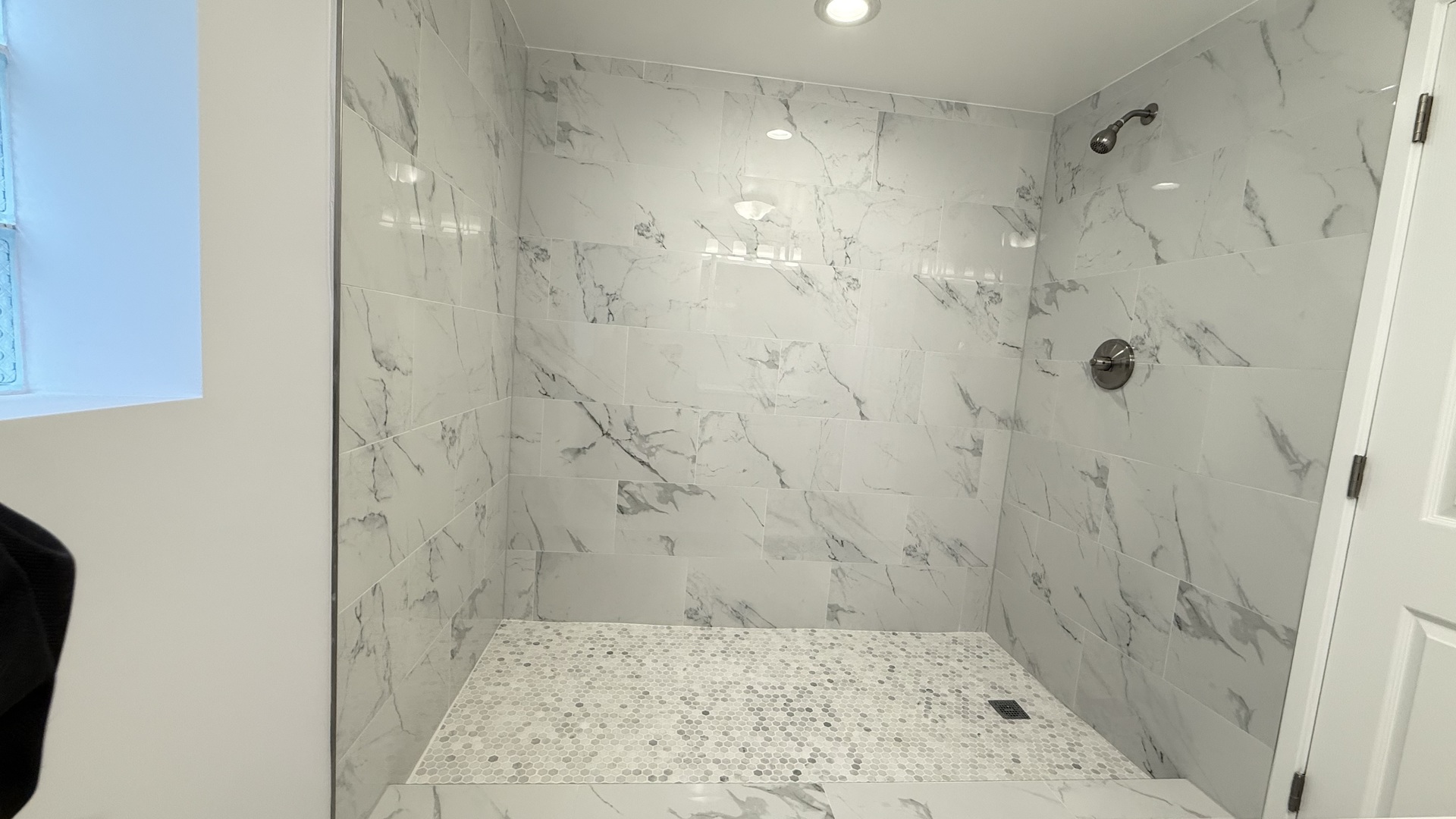 1345 North Latrobe Avenue Chicago, IL 60651 - Photo 48 of 50 a bathroom with a shower