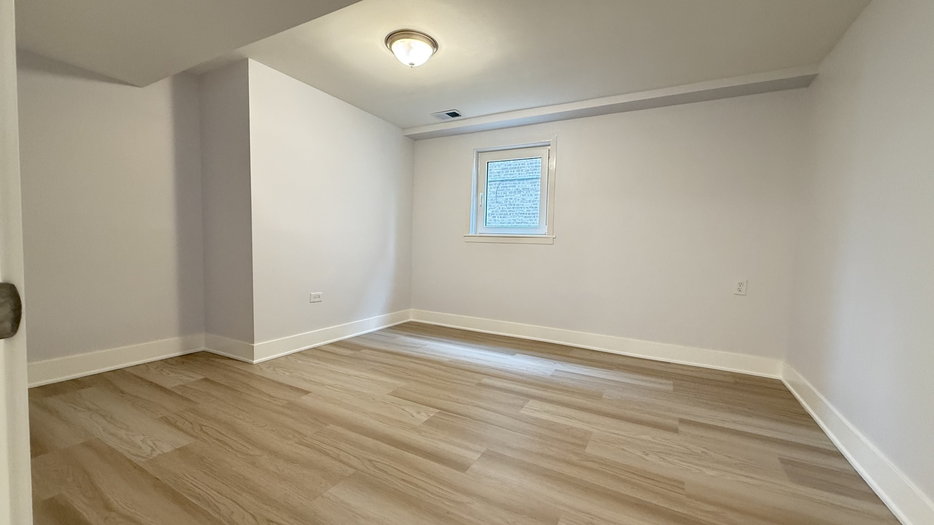 1345 North Latrobe Avenue Chicago, IL 60651 - Photo 50 of 50 wooden floor in an empty room