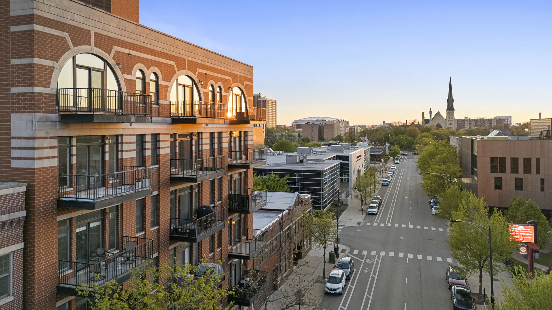 1355 West Washington Boulevard, Unit 4D Chicago, IL 60607 - Photo 2 of 46 a view of a building with many windows
