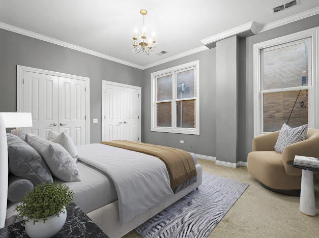 1355 West Washington Boulevard, Unit 4D Chicago, IL 60607 - Photo 26 of 46 a bedroom with bed couch and window