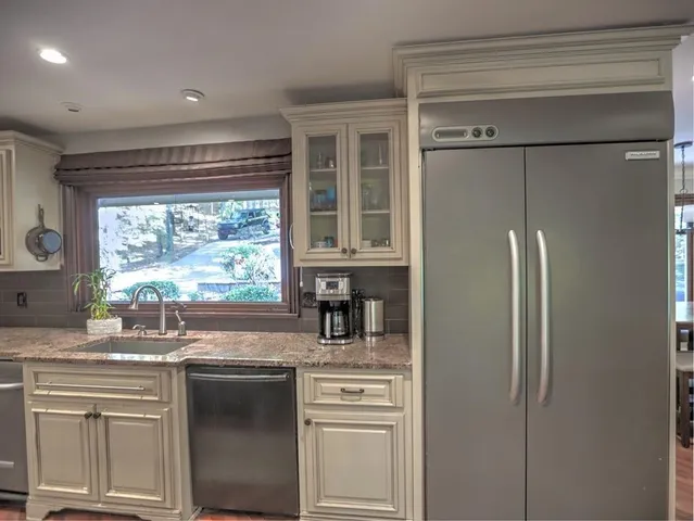 a view of a hallway with staircase