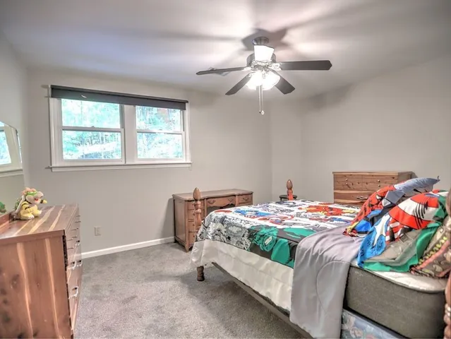 a view of livingroom with washer and dryer