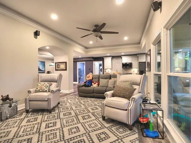 a view of a two chairs in the balcony