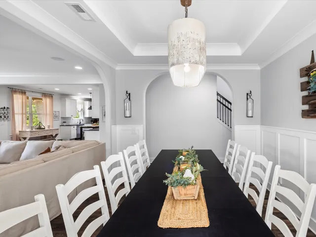 a bedroom with a bed and a night stand