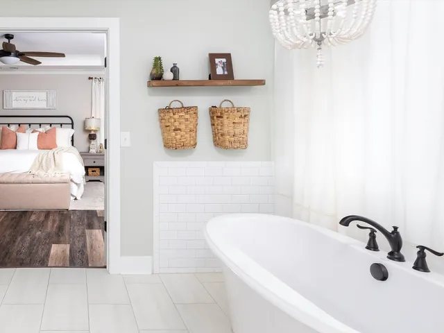 a balcony with furniture and a potted plant