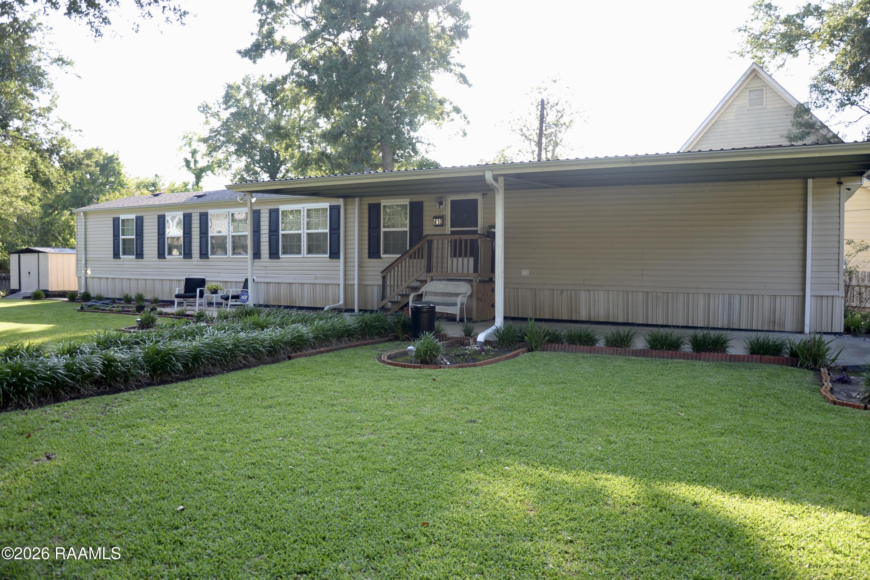 413 Hebert Street Jeanerette, LA 70544 - Photo 3 of 20 Front