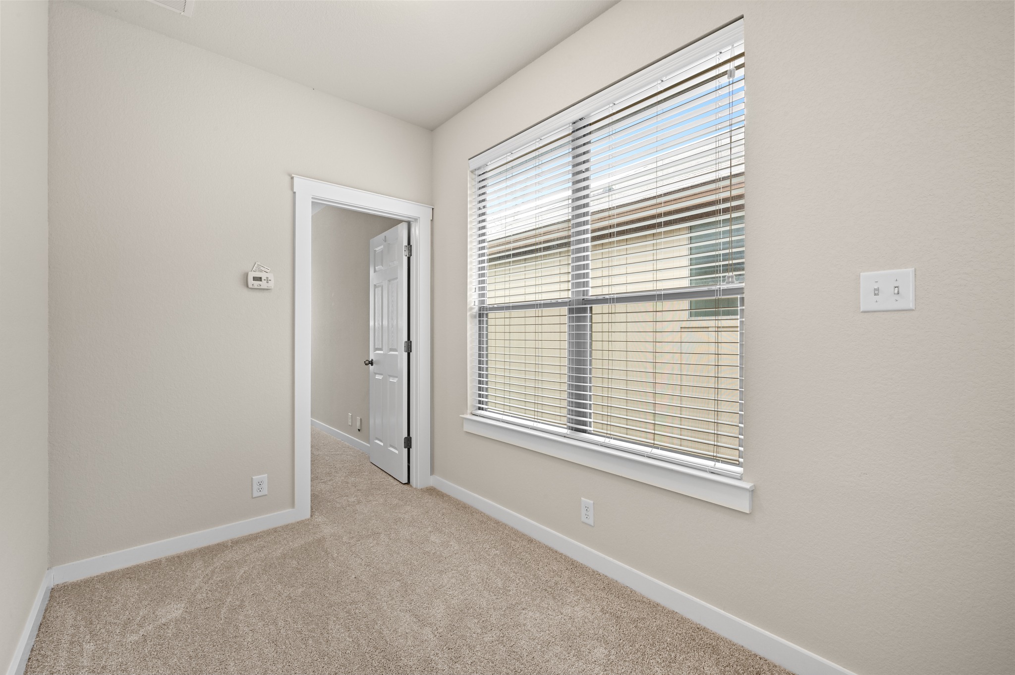 2101 Rivers Edge Way, Unit 32 Austin, TX 78741 - Photo 16 of 24 Wndows are on the opposite side of the previous photo, at the landing.