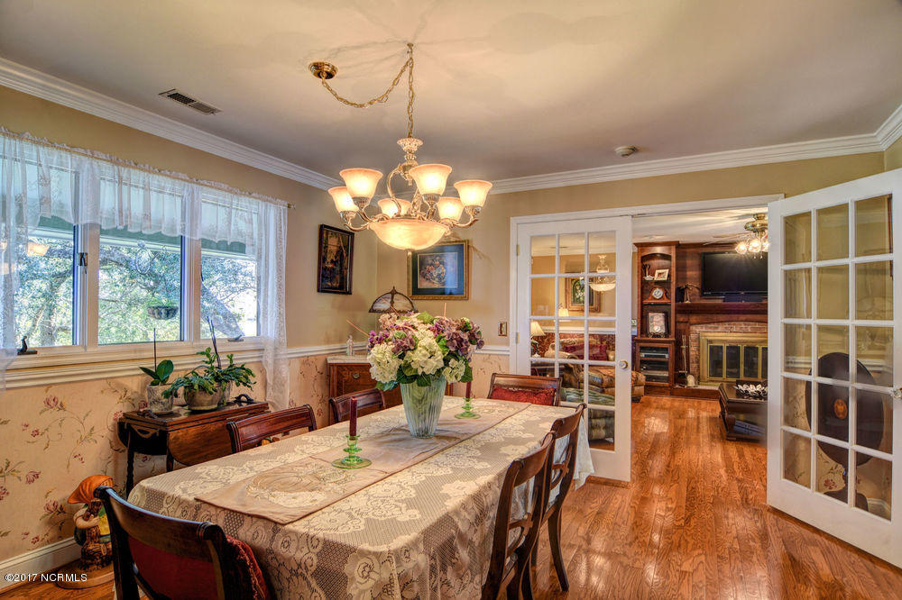 352 Olde Point Loop Hampstead, NC 28443 - Photo 16 of 59 Formal dining with French doors