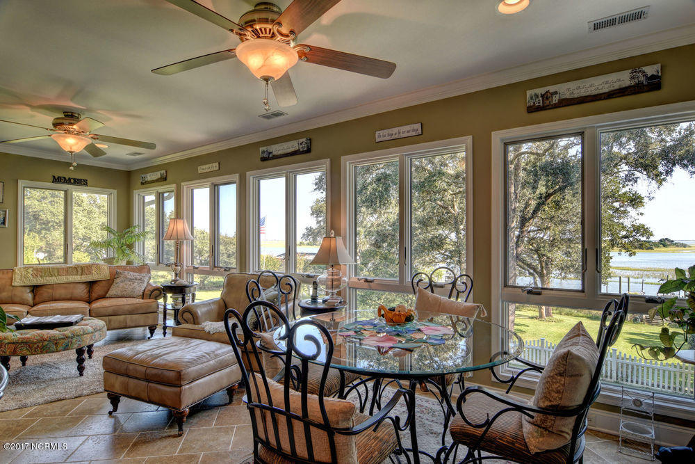 352 Olde Point Loop Hampstead, NC 28443 - Photo 21 of 59 Inviting and versatile sunroom frames the ICW