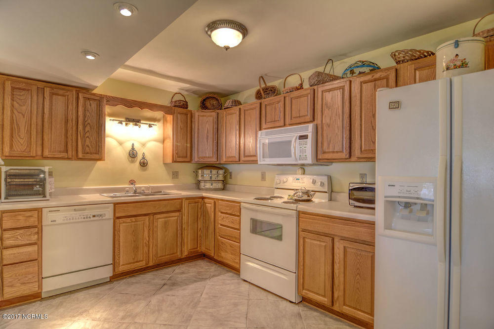 352 Olde Point Loop Hampstead, NC 28443 - Photo 41 of 59 2nd kitchen downstairs is fully equipped & has views!