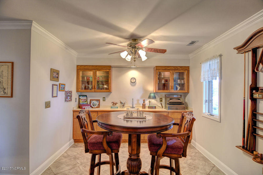 352 Olde Point Loop Hampstead, NC 28443 - Photo 42 of 59 Built-ins make a nice 2nd dining room or additional game space