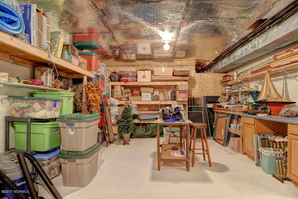 352 Olde Point Loop Hampstead, NC 28443 - Photo 47 of 59 Huge basement storage room makes a nice workshop too
