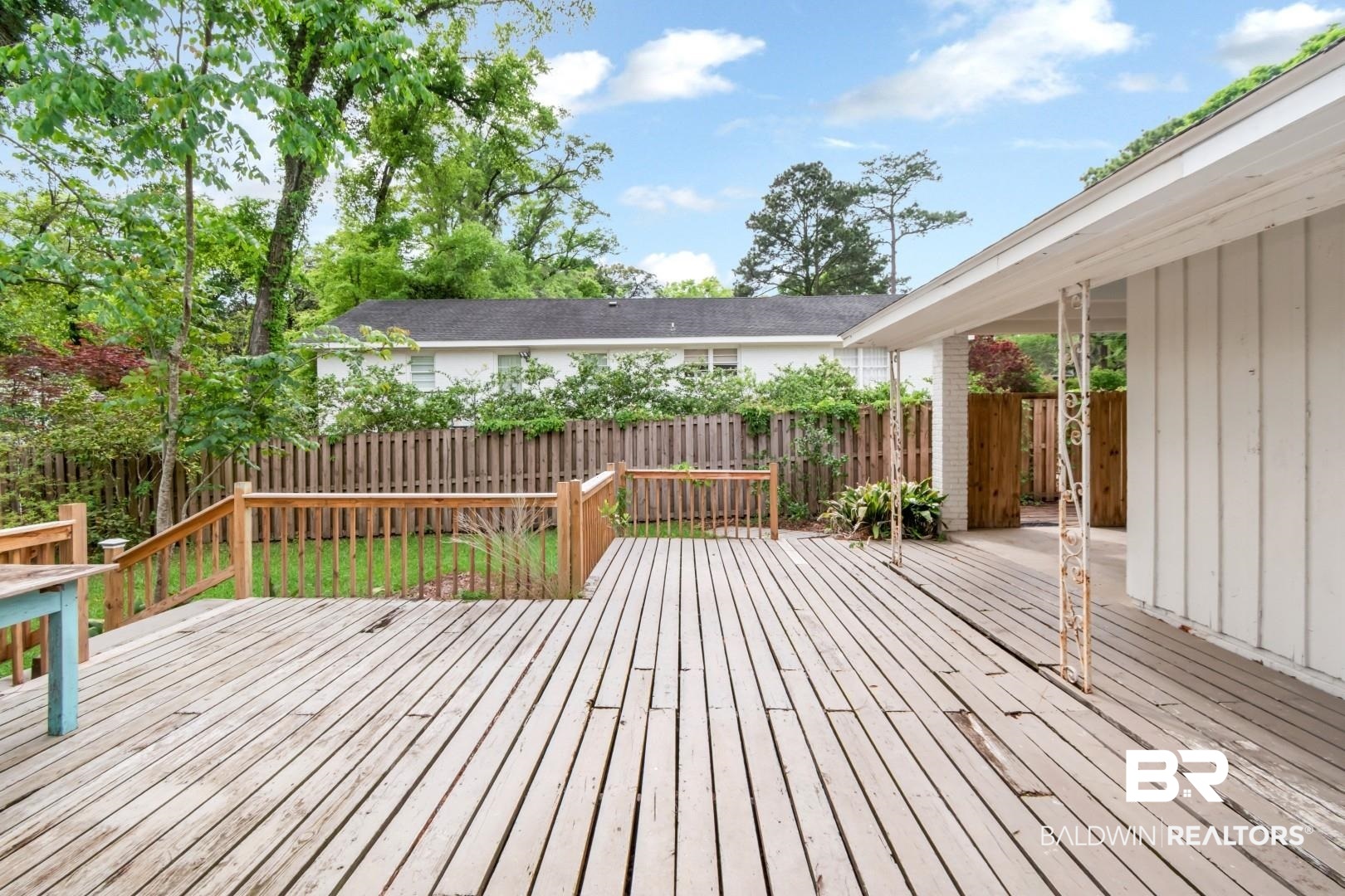 4 Turnout Lane Mobile, AL 36608 - Photo 26 of 53 Wooden terrace with a fenced backyard