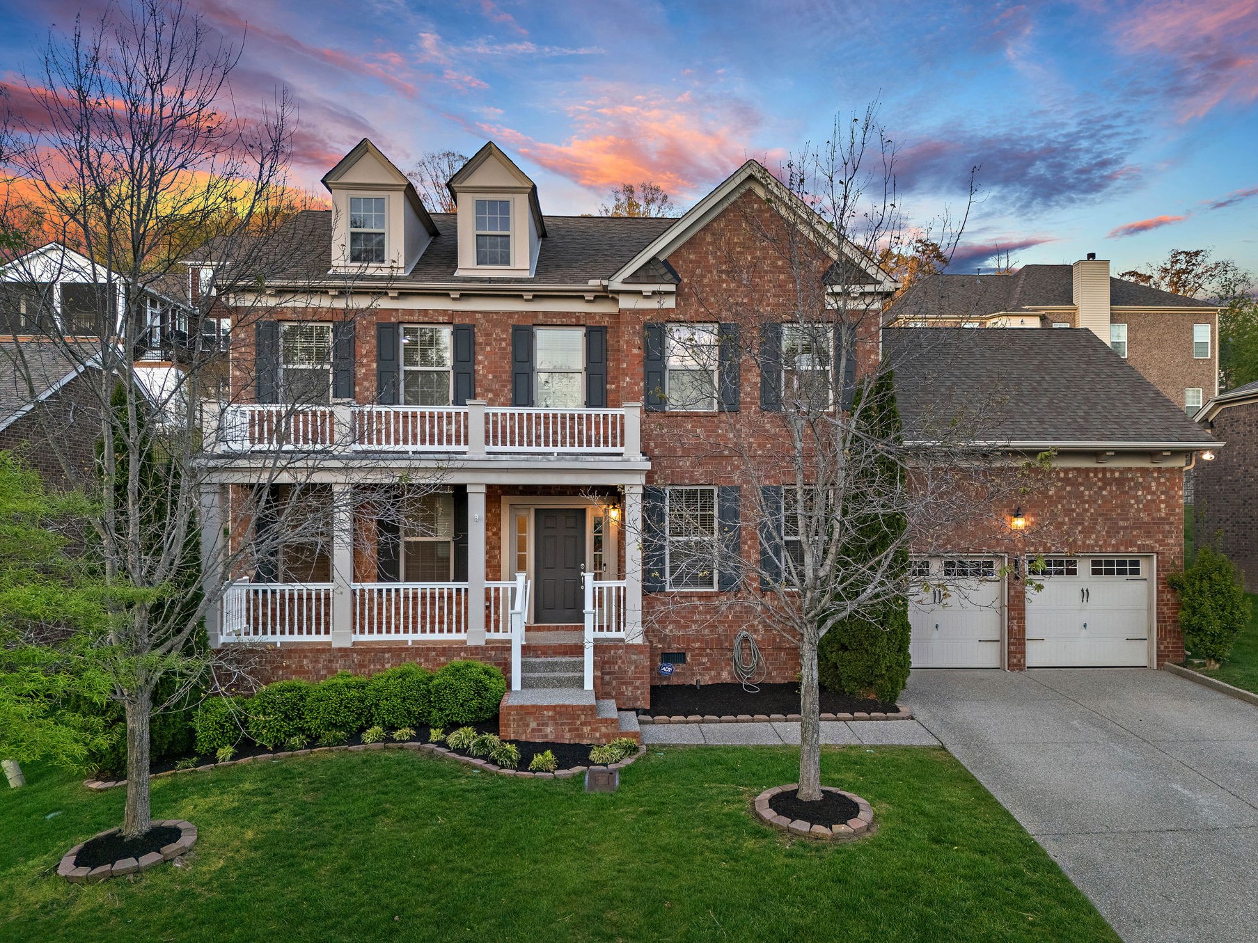 1228 Broadgate Drive Franklin, TN 37067 - Photo 1 of 44 a front view of a house with a yard and green space