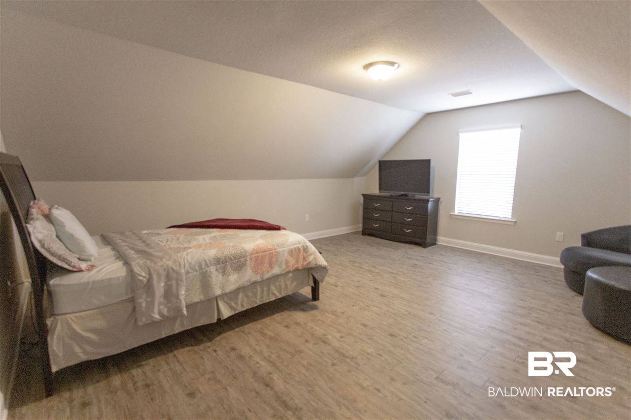 7637 Kari Lane Daphne, AL 36526 - Photo 22 of 28 LVP flooring