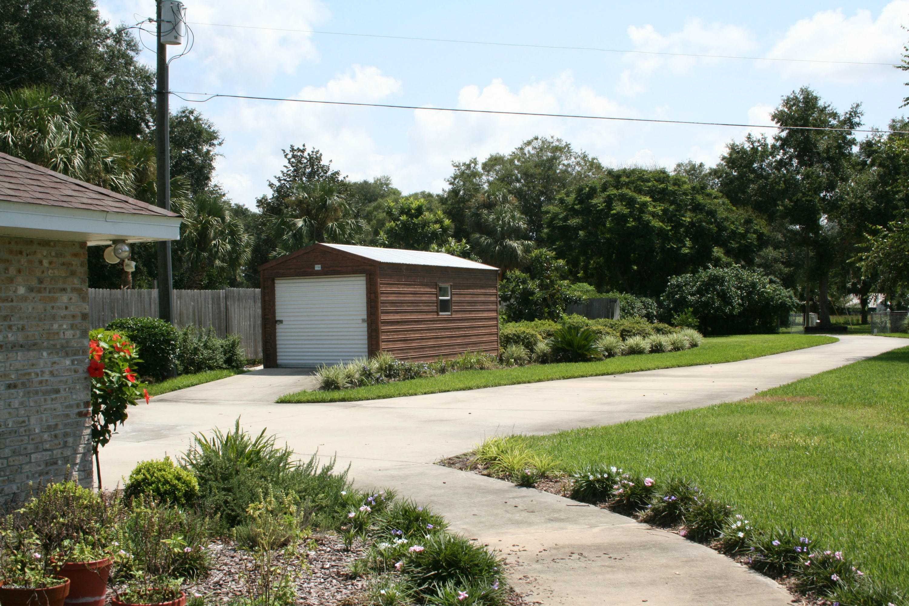 105 Riverside Way San Mateo, FL 32187 - Photo 20 of 22 Storage Shed