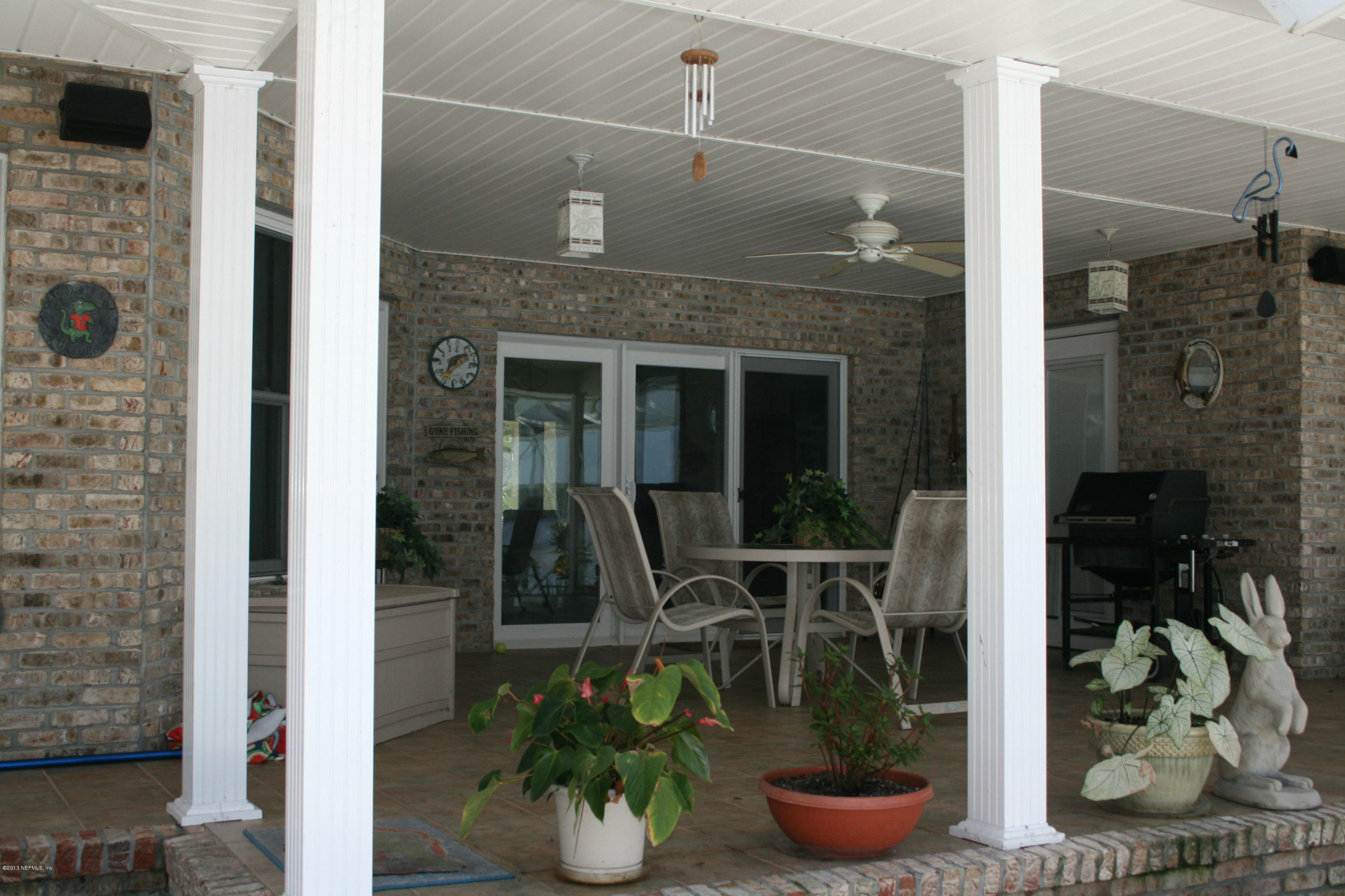 105 Riverside Way San Mateo, FL 32187 - Photo 10 of 22 Covered Portion of Lanai