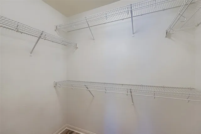a view of a room with racks on the wall