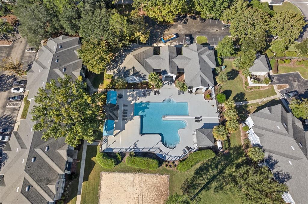 3705 Southwest 27th Street, Unit 913 Gainesville, FL 32608 - Photo 38 of 50 an aerial view of a house with outdoor space