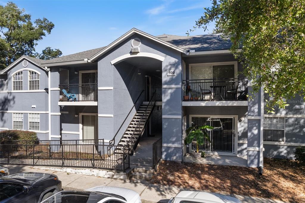 3705 Southwest 27th Street, Unit 913 Gainesville, FL 32608 - Photo 50 of 50 a front view of a house with garage