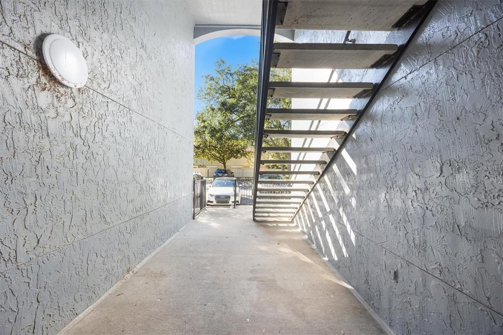 3705 Southwest 27th Street, Unit 913 Gainesville, FL 32608 - Photo 10 of 50 a view of entryway with stairs