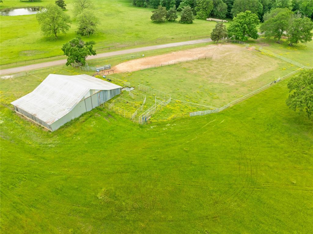 1355 County Road 33100 Sumner, TX 75486 - Photo 12 of 34 Aerial view of sparsely populated area with a large body of water and a pastoral area