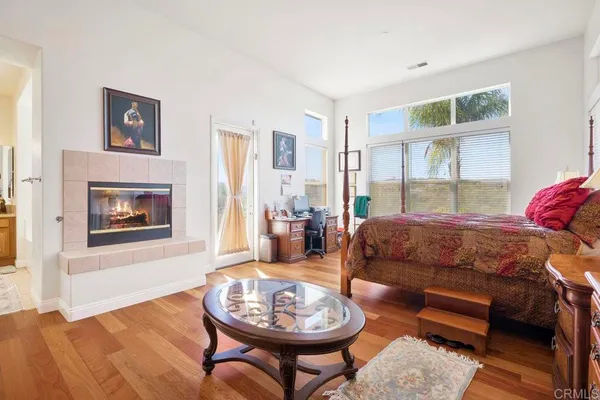 a living room with furniture and a gate
