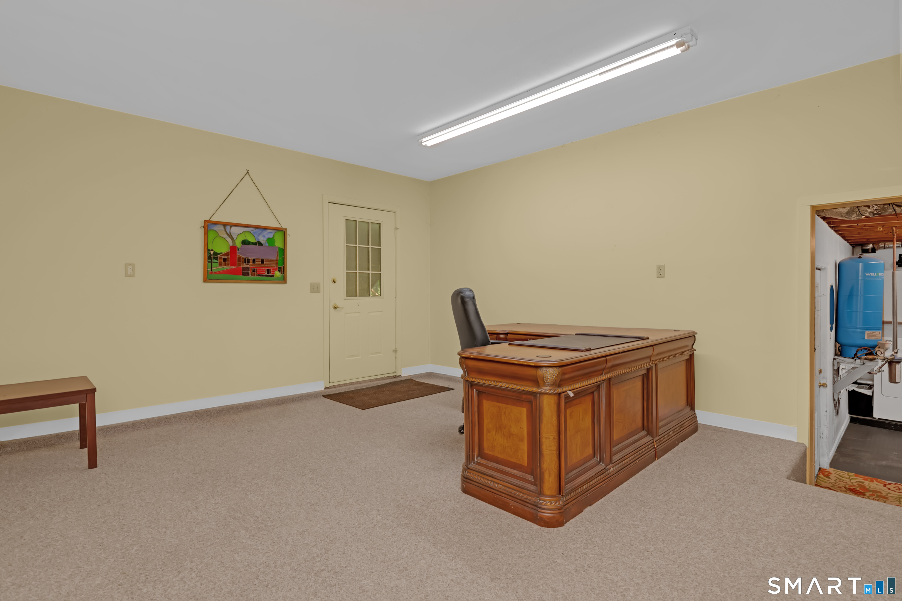 90 Bell Street Manchester, CT 06040 - Photo 27 of 40 a room with furniture and air conditioner vent