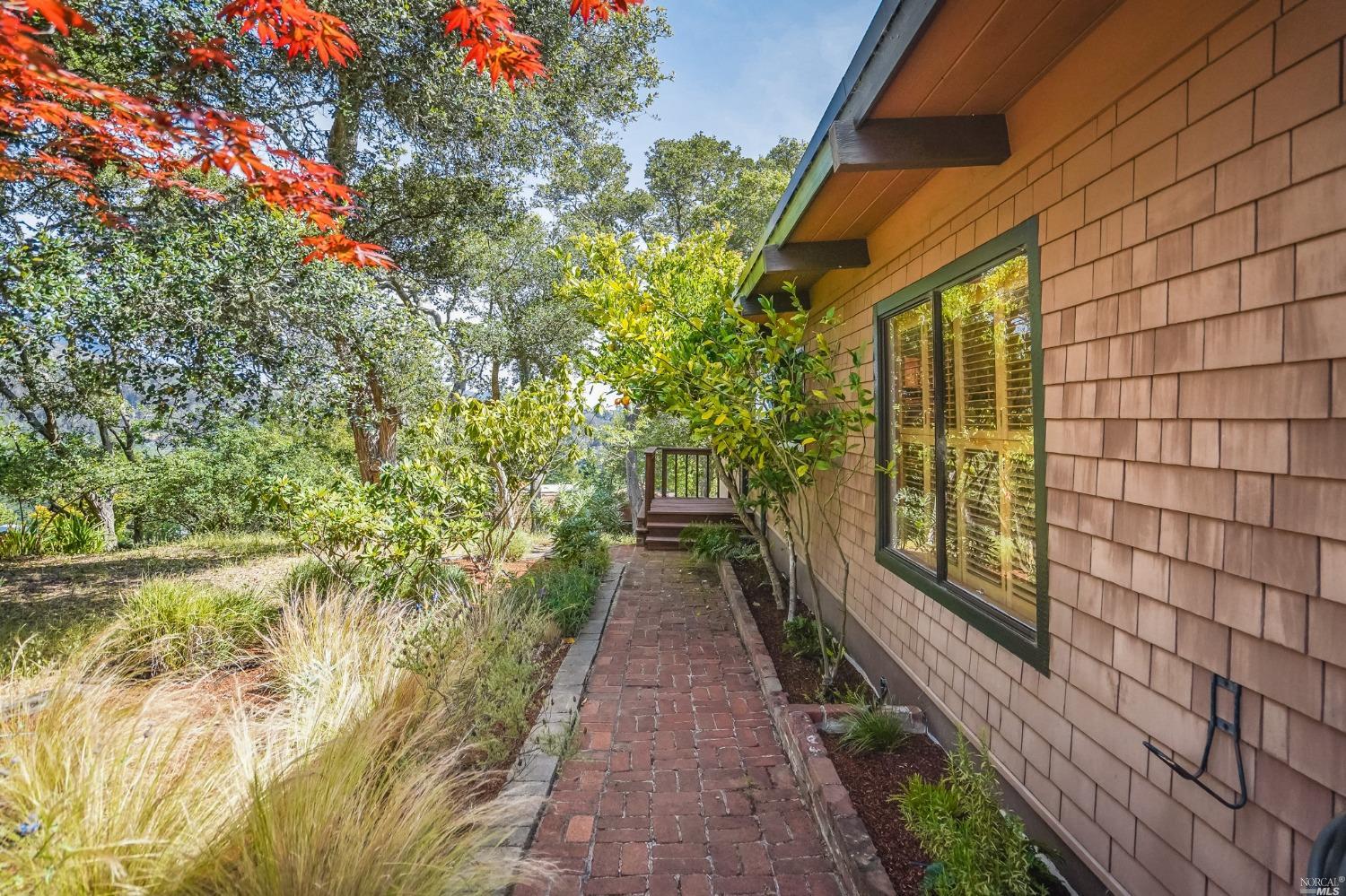 816 Spring Drive Mill Valley, CA 94941 - Photo 1 of 1 a view of a pathway both side of house
