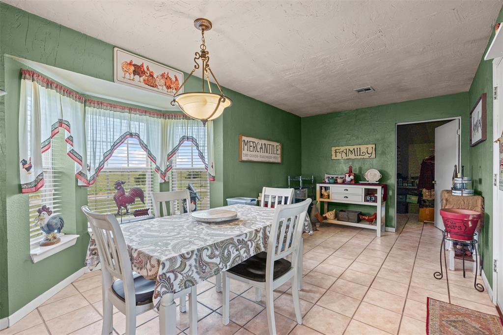 14522 Southwest County Road 4140 Dawson, TX 76639 - Photo 15 of 40 a view of a dining room with furniture