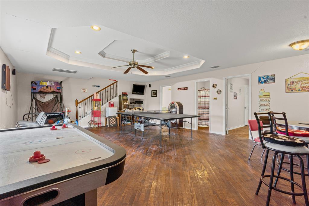 14522 Southwest County Road 4140 Dawson, TX 76639 - Photo 25 of 40 a view of a dining room with furniture and wooden floor