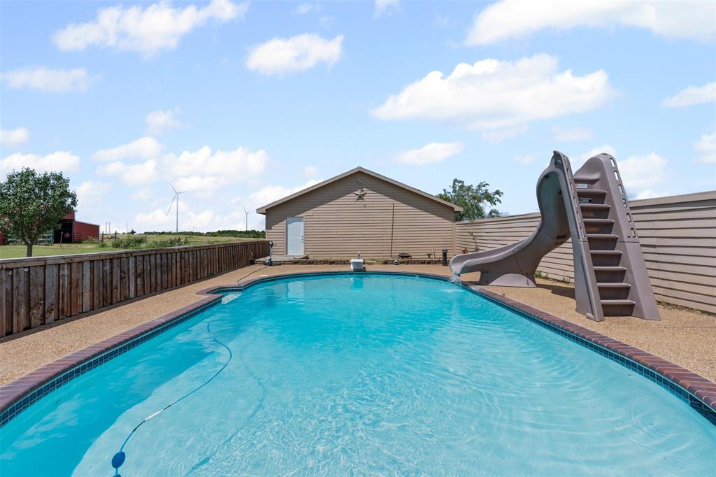 14522 Southwest County Road 4140 Dawson, TX 76639 - Photo 33 of 40 a view of a house with backyard