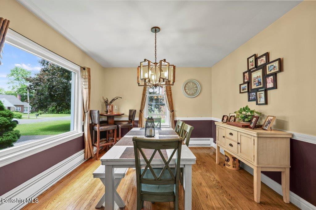 33 Eleanor Road Pittsfield, MA 01201 - Photo 11 of 45 a view of a dining room with furniture window and outside view