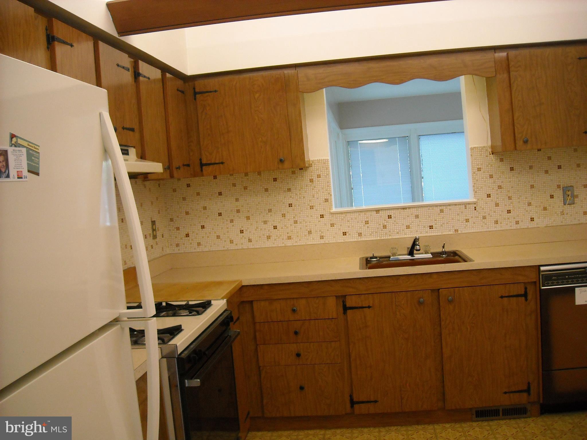 523 Michille Road Odenton, MD 21113 - Photo 4 of 12 Kitchen w Pass-thru window to Sunroom